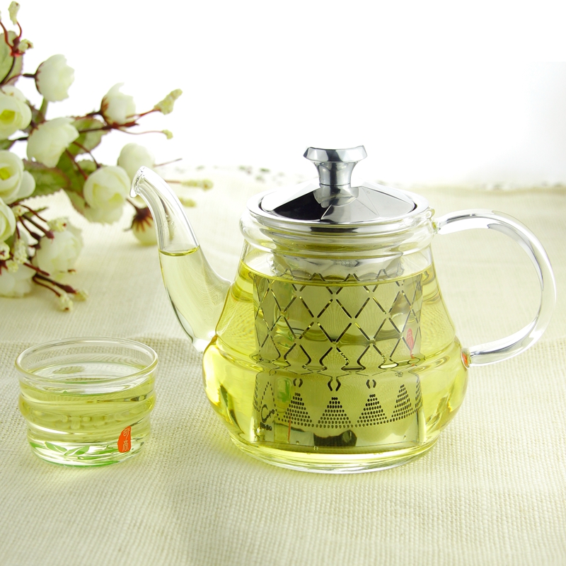 Glass teapot with diamond shaped stainle